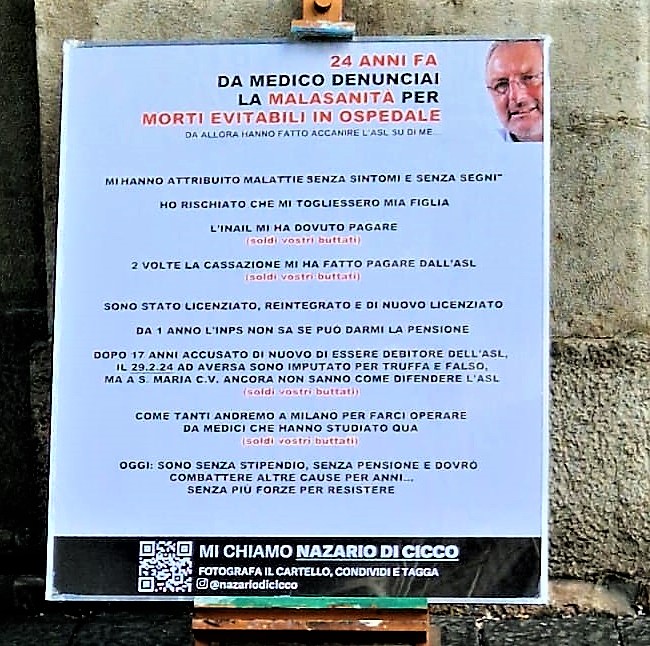 %name AVERSA, LA PIAZZA, UN CARTELLO: “SOLDI VOSTRI BUTTATI”